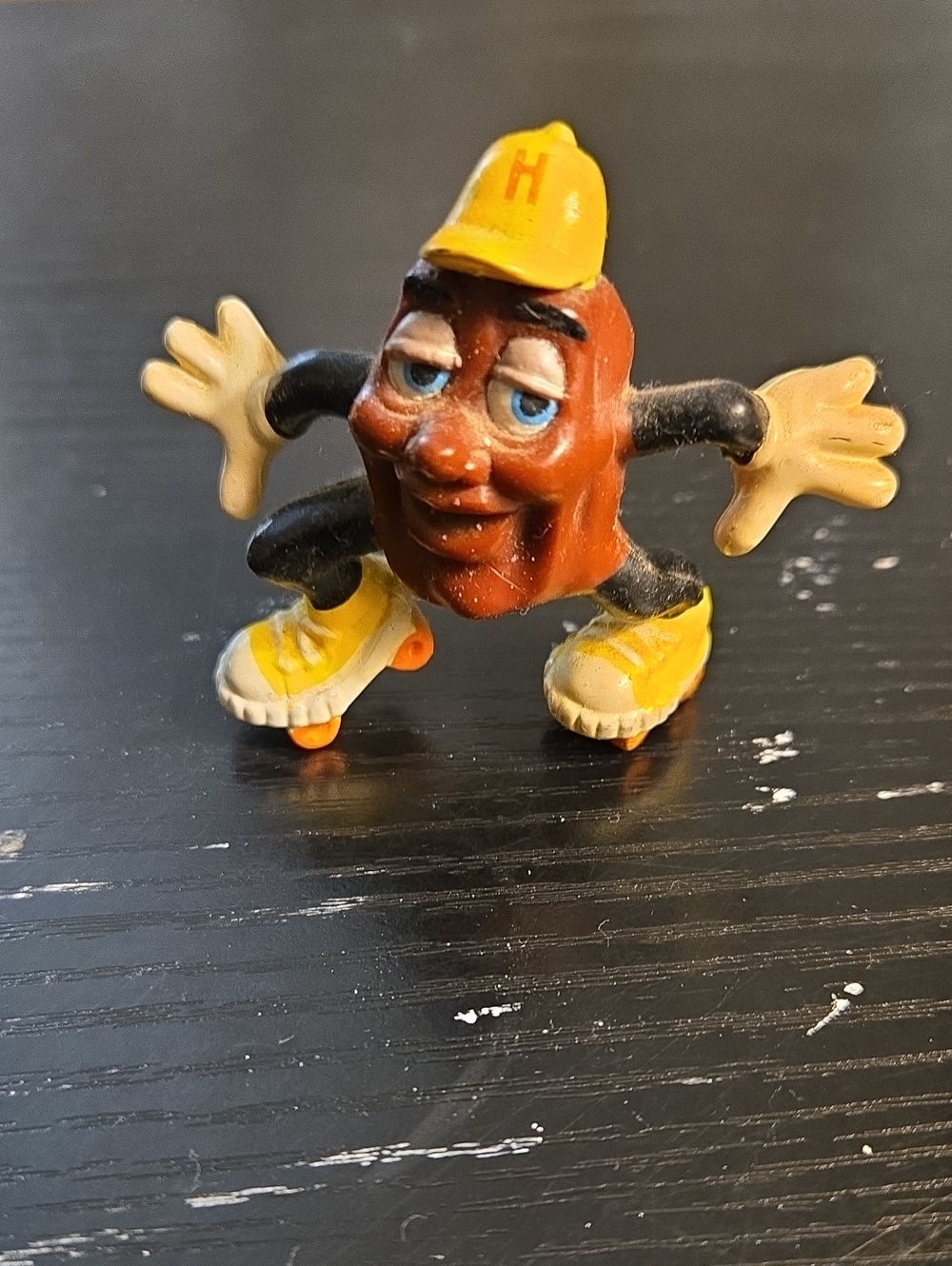 Disney Brown Skate Shoe Raisin Figure with Yellow Hat and Shoes